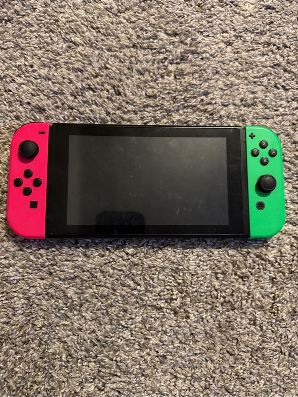 Nintendo Switch with Pink Left and Green Right Joy‑Con